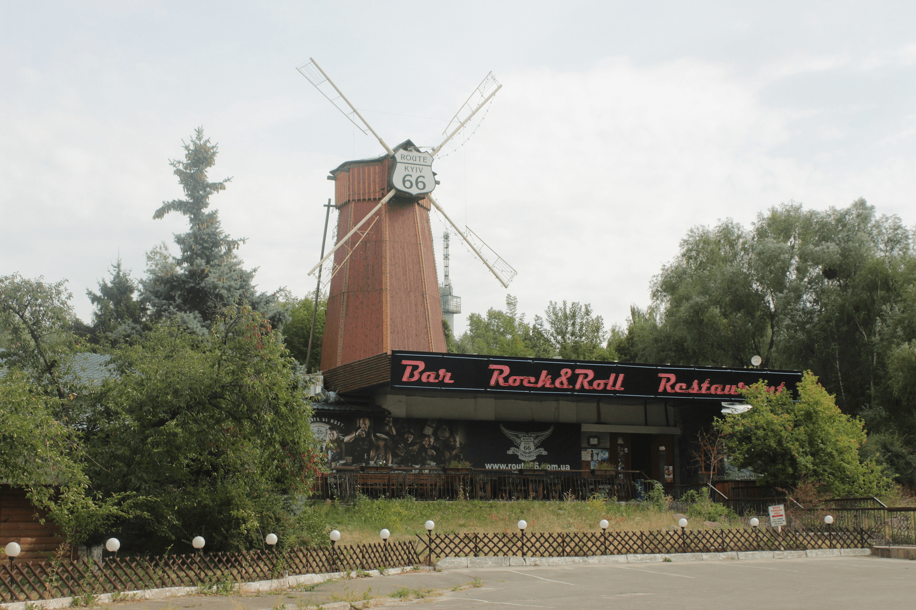 The restaurant, with a poster obscuring the mosaic.