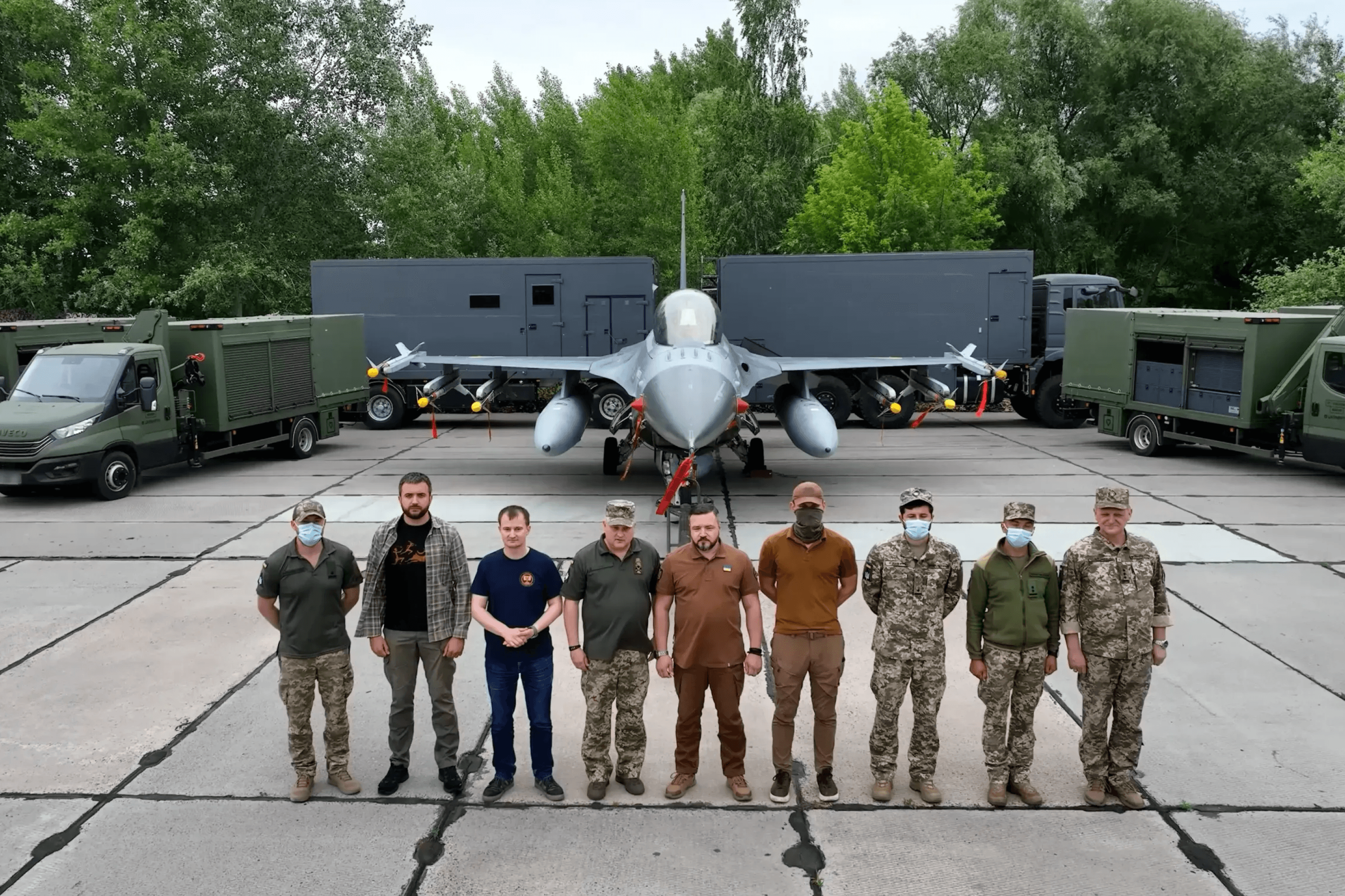A Ukrainian Air Force F-16 fighter jet and mobile aircraft maintenance units. Ukraine, July 2025.