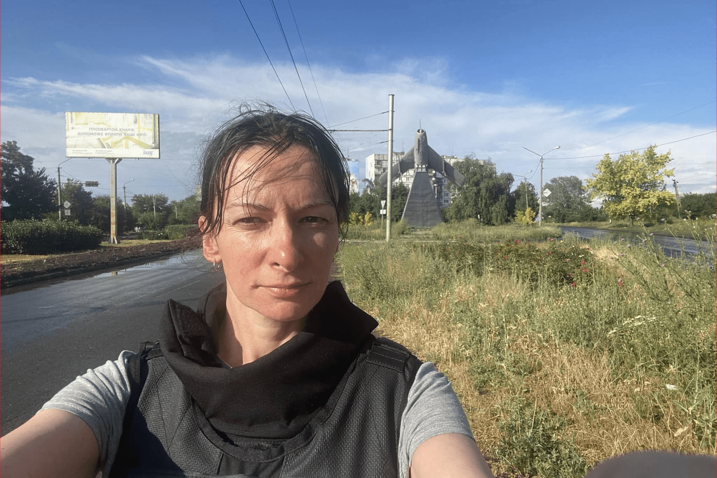 Kristina Berdynskykh in Bakhmut, Donetsk Oblast, while reporting from the front. July 2022.
