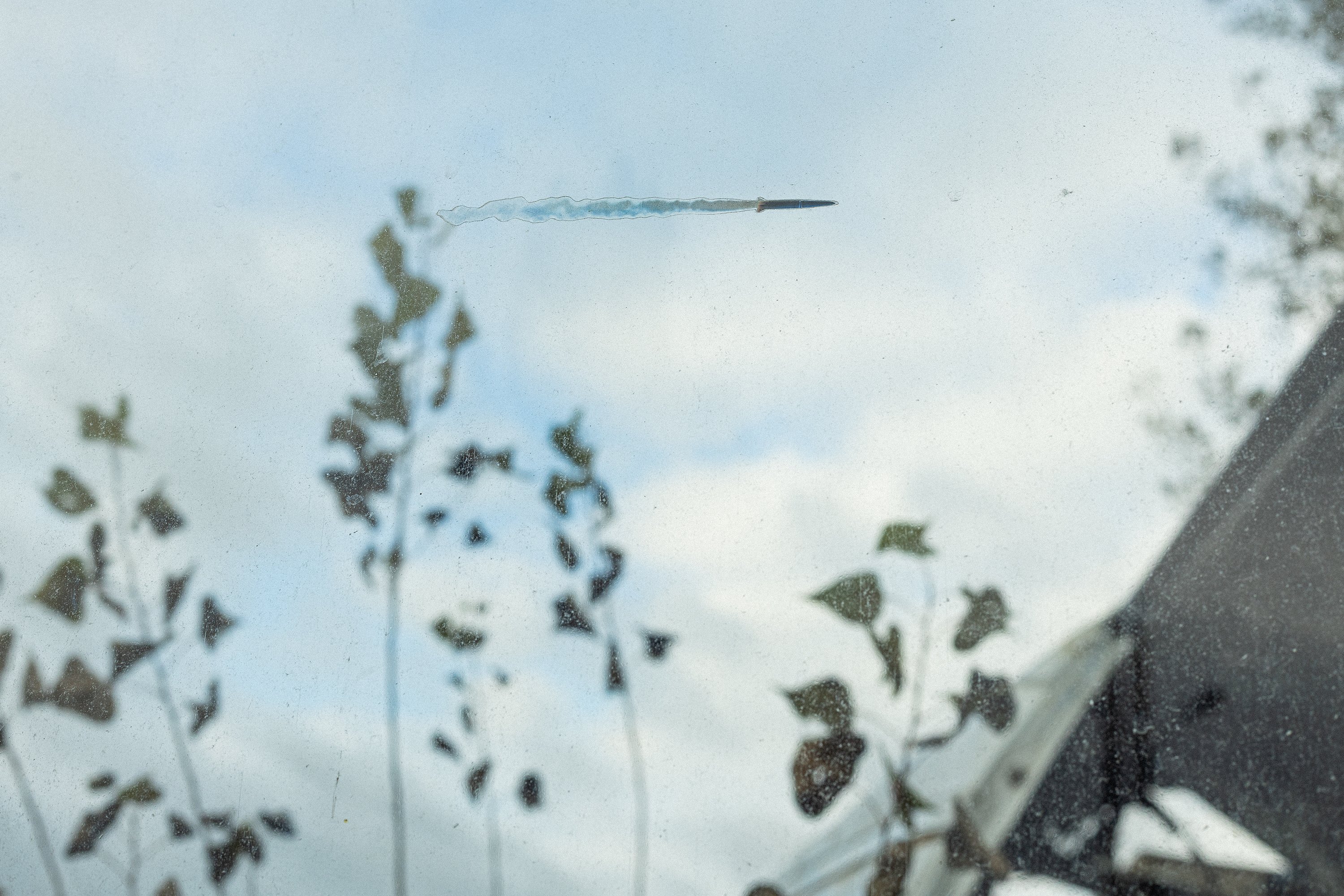 A rocket sticker on the window of Leonid’s van, part of Zhanna Kadyrova’s street art project "Russian Rocket", created in 2022 to remind people in Europe about Russia’s war against Ukraine.