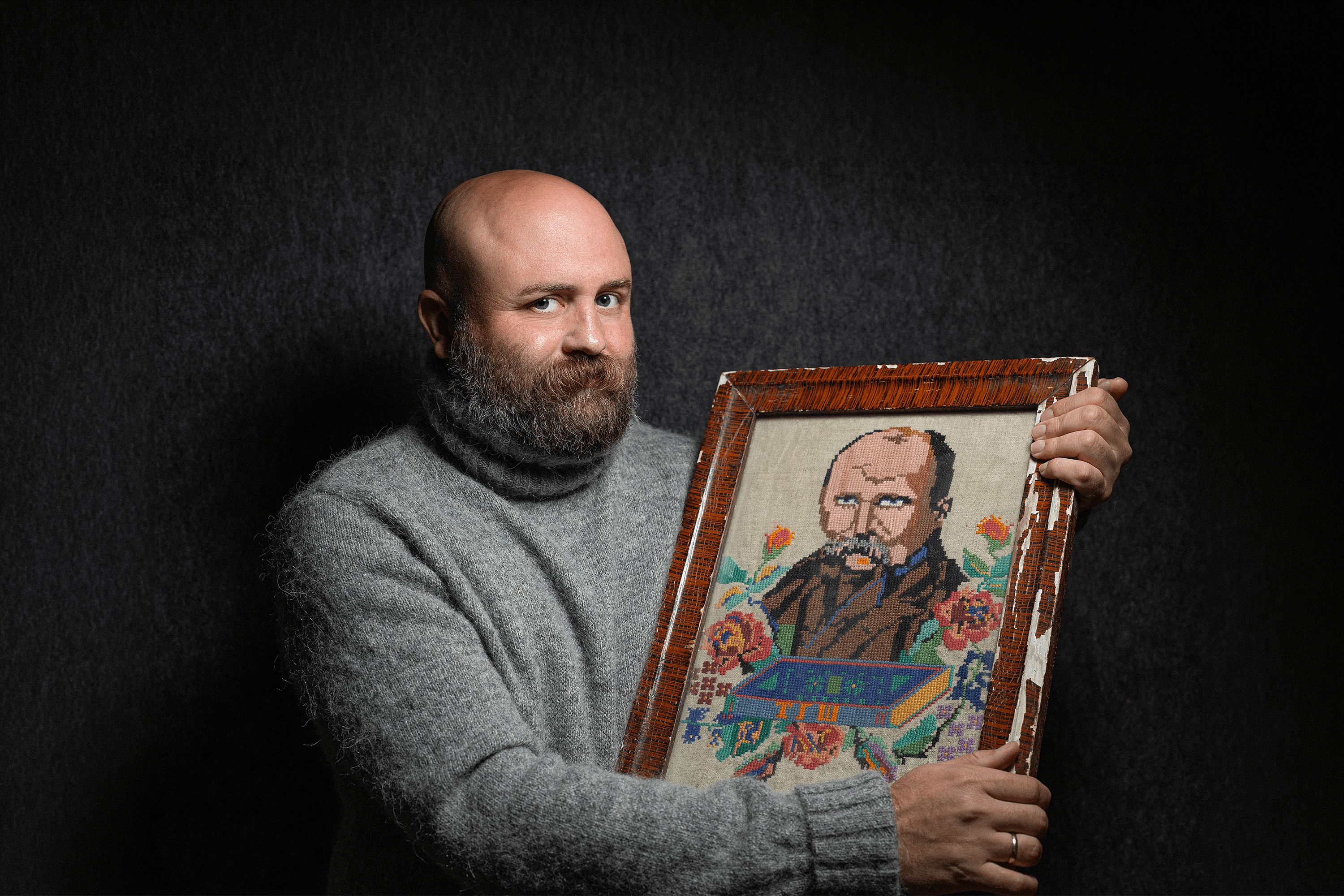 Leonid Marushchak with an embroidered portrait of the Ukrainian writer Taras Shevchenko. Art that cannot be held captive: Leonid Marushchak’s four-year mission to rescue Ukrainian artifacts from Russian shelling and occupation