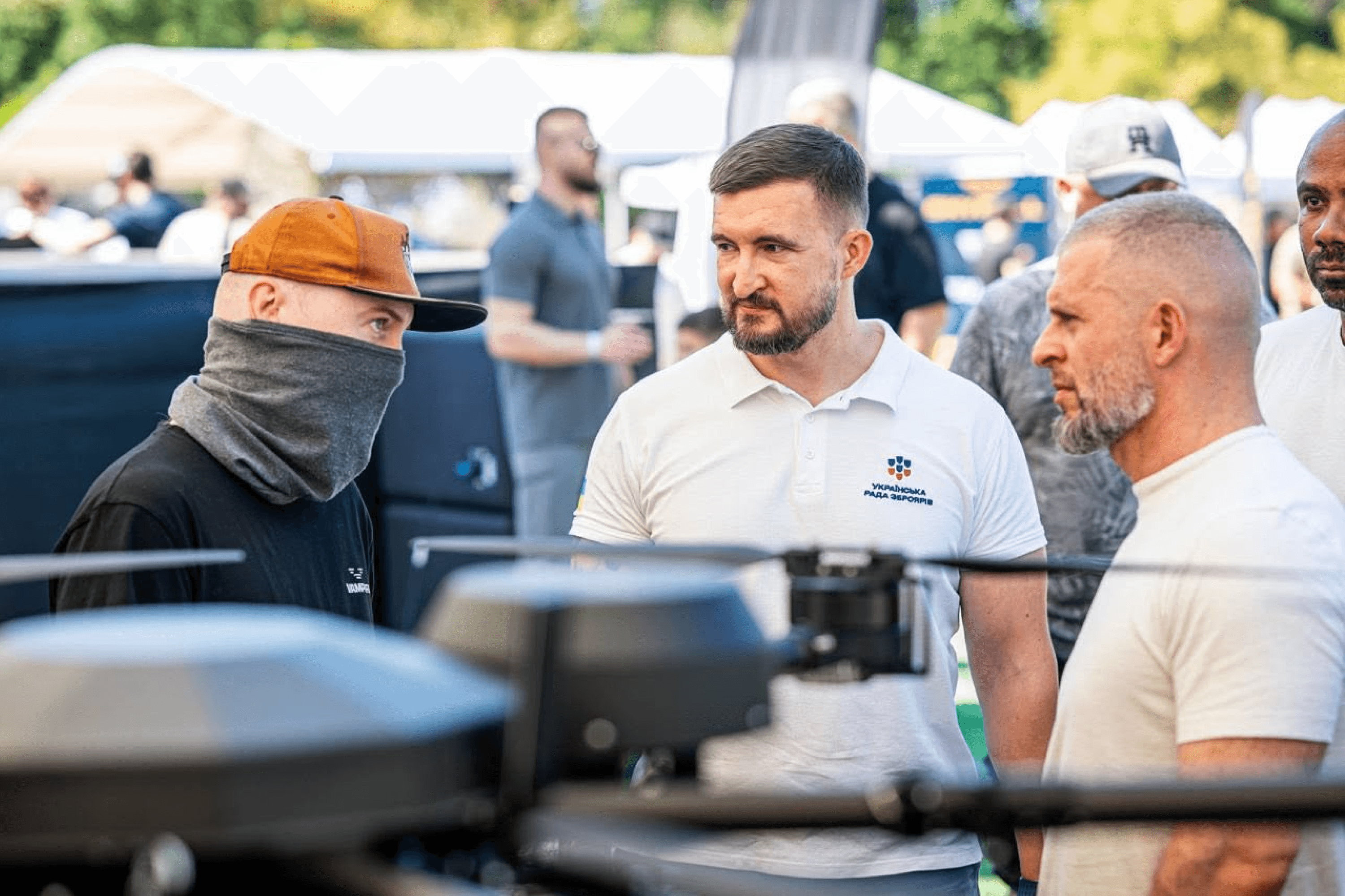 Ihor Fedirko (center) at the Ukrainian Technological Sports Championship, which brought together manufacturers of drones, components, and ground robotic systems. August 2025.