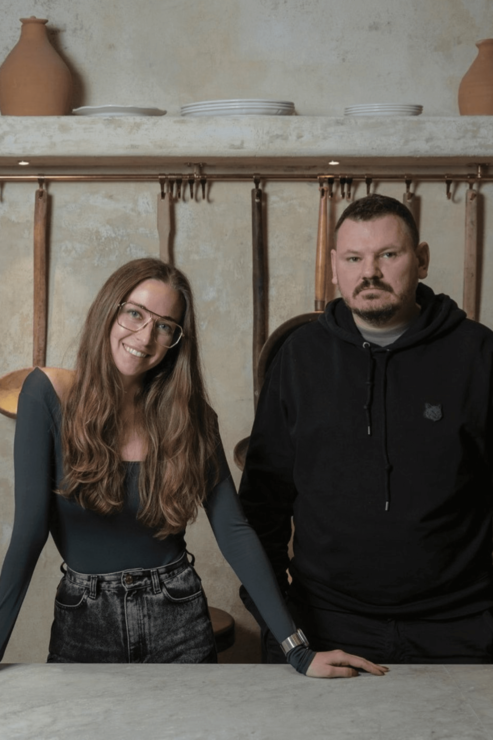 Anna Andriienko and Alex Cooper.