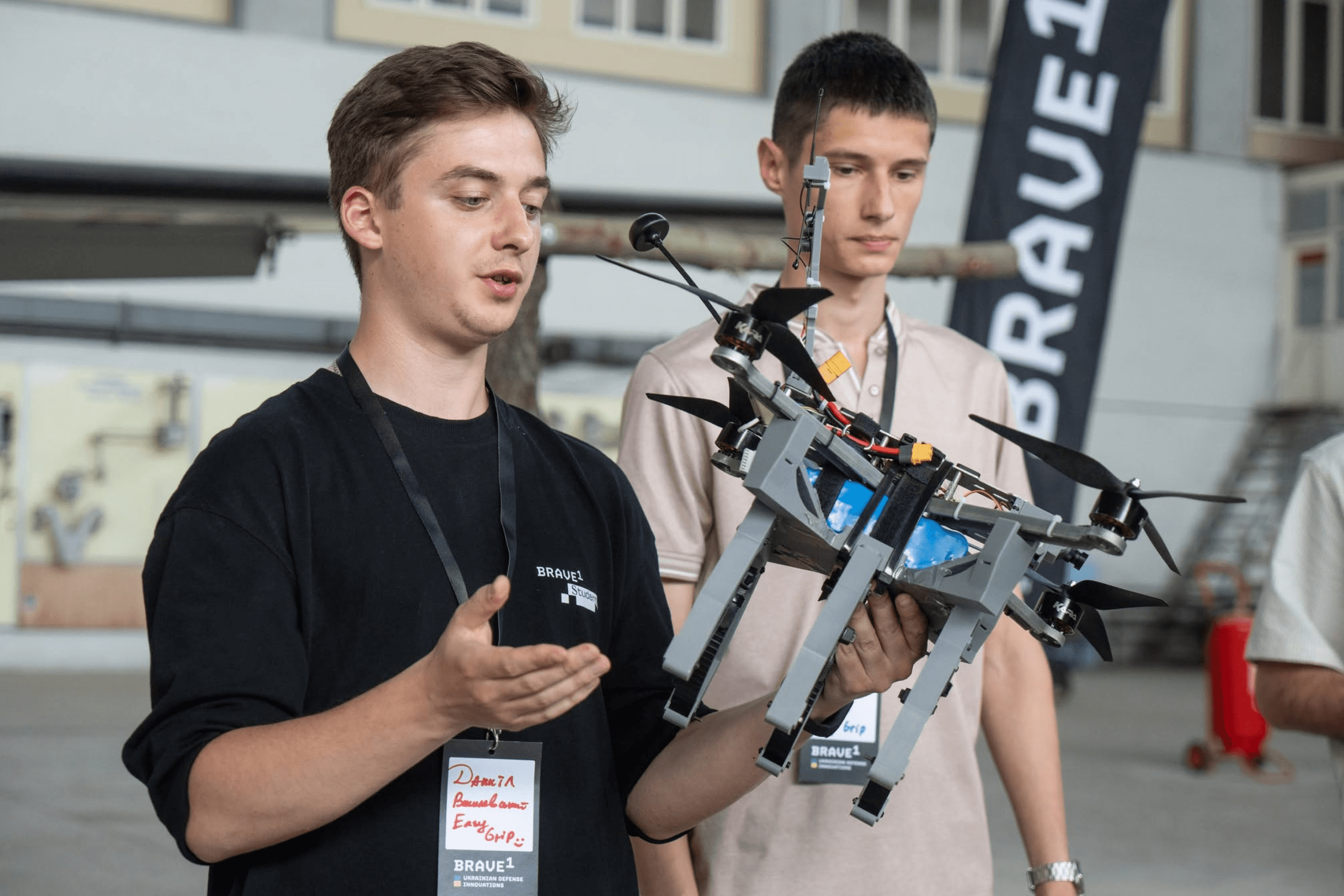 A Defense Tech Valley 2025 participant demonstrates an unmanned aerial vehicle (UAV). Kyiv, September 2025.