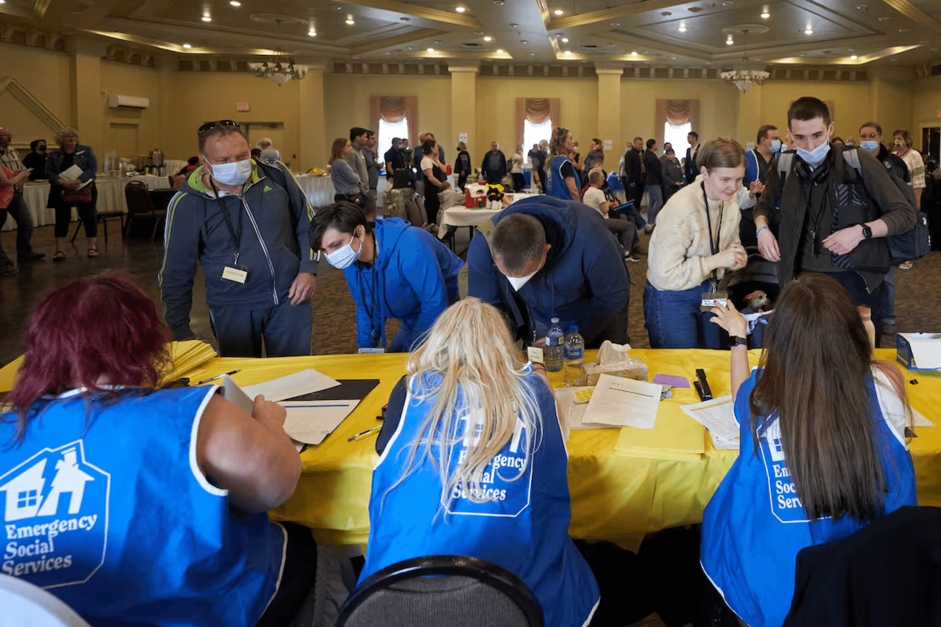 Ukrainian refugees during registration at a reception center in Winnipeg, Canada.