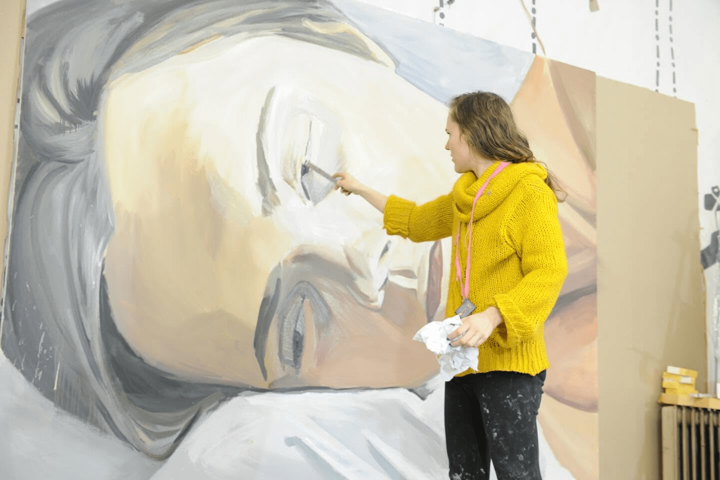 Lesia Khomenko in her studio while working on a self-portrait. 2013.