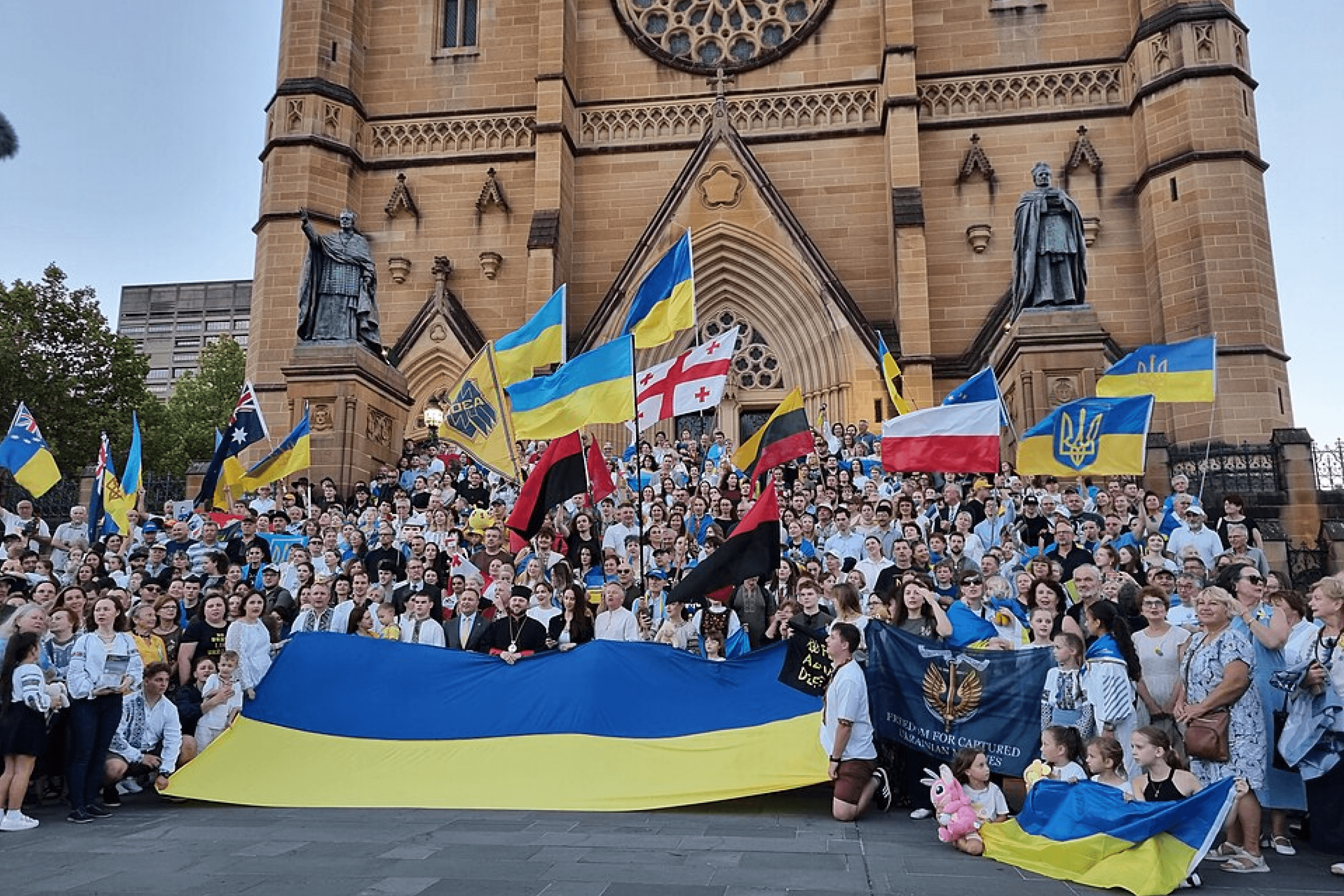 Participants at a rally marking the anniversary of Russia’s full-scale invasion of Ukraine in Sydney, Australia. February 24, 2026.