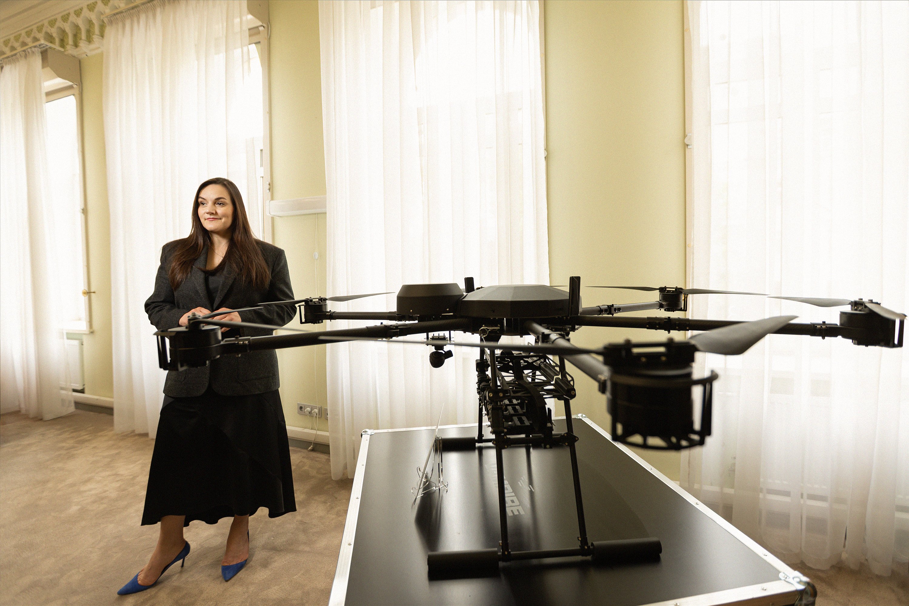 Tetiana Berezhna and the Ukrainian-made “Vampire” bomber drone.