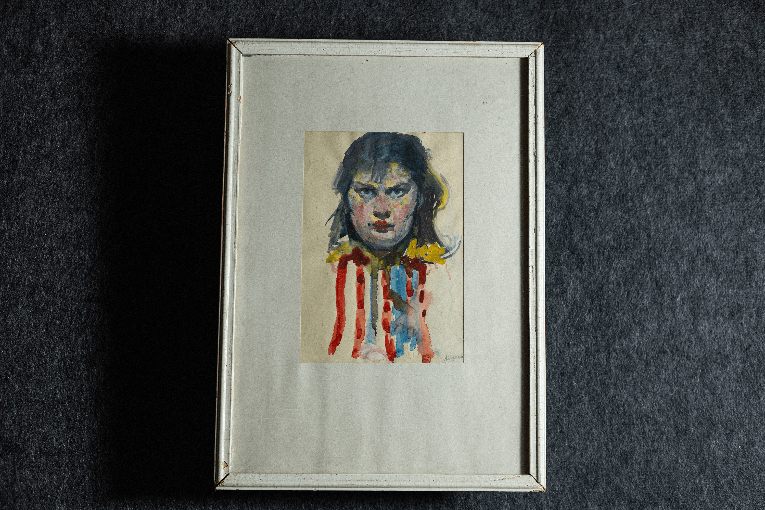 A self-portrait by Alla Horska, gifted to Leonid by Olena Zaretska; the wooden frame was made by artist Viktor Zaretskyi.