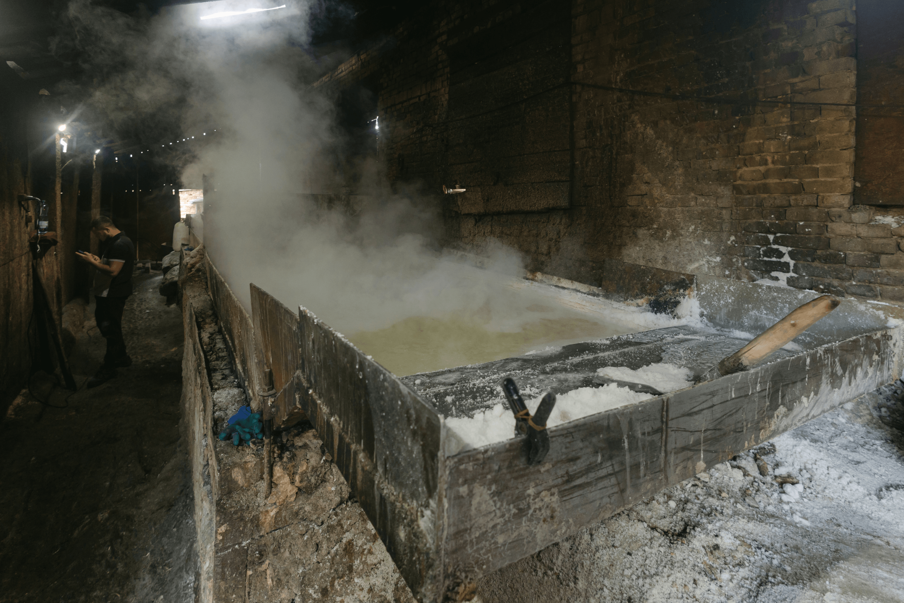 An evaporation pan where water is evaporated from the brine, leaving only salt behind.