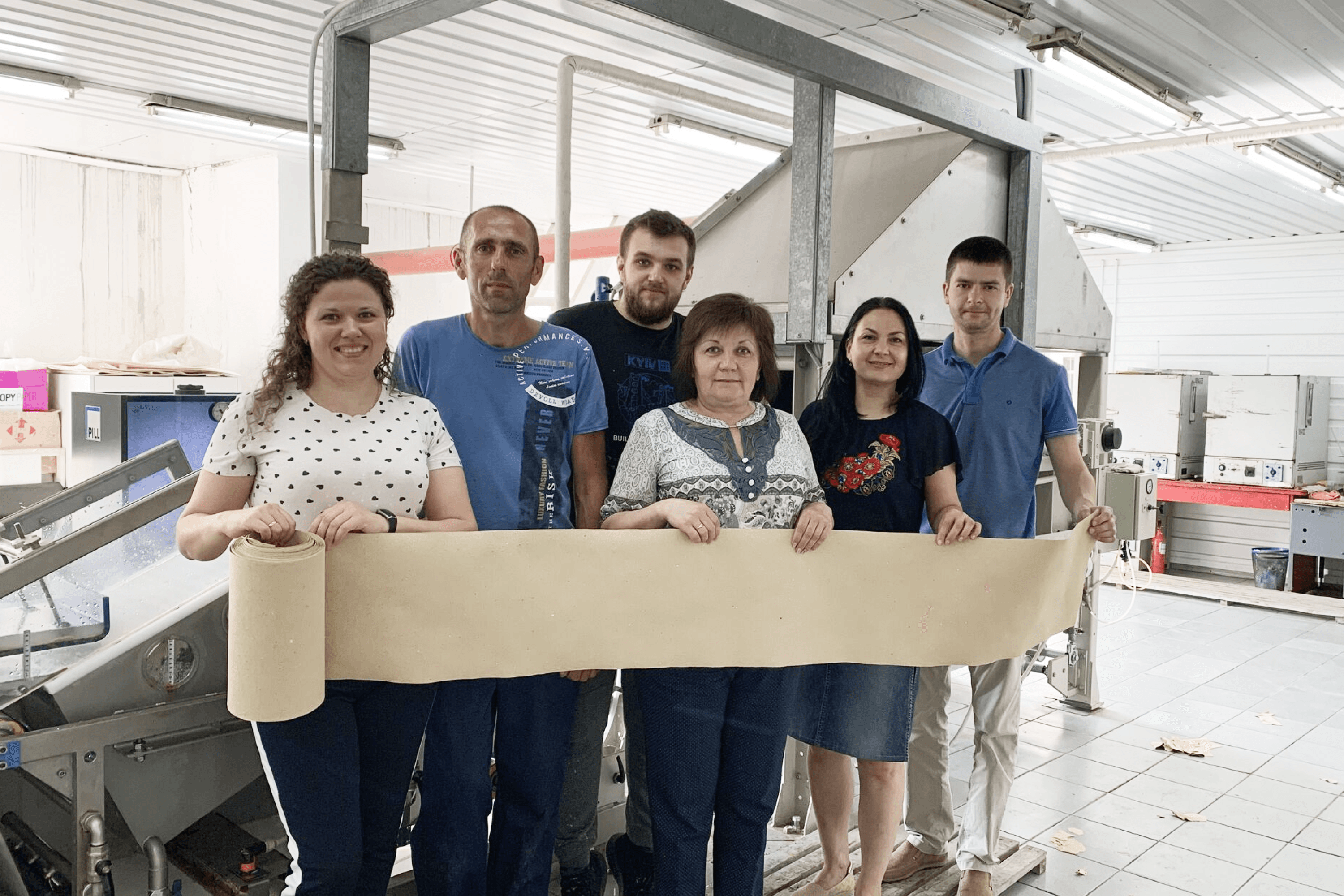 The Releaf Paper team at a laboratory in Kherson, where they created the first machine-made paper samples from fallen leaves. 2019.