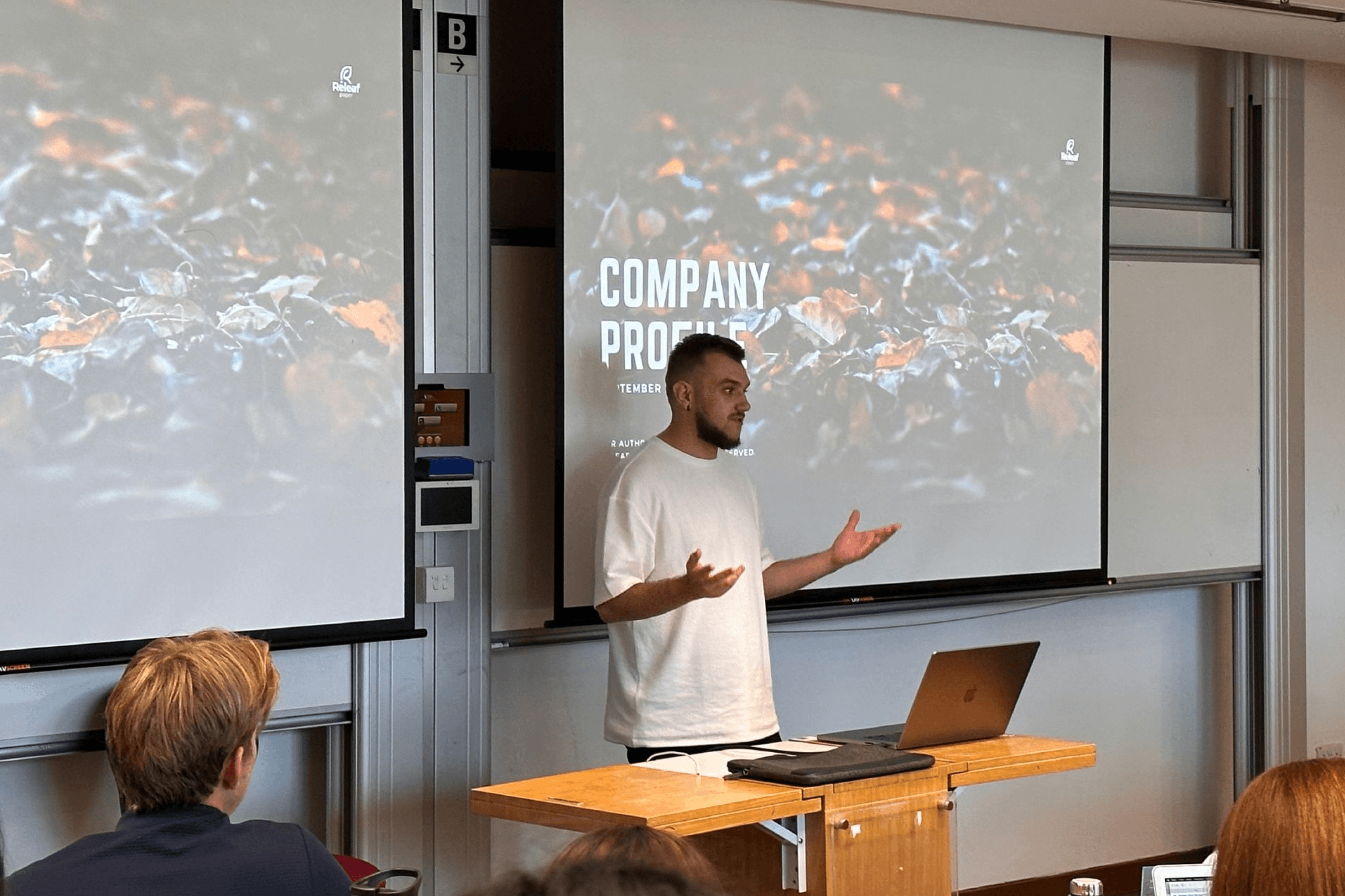Valentyn Frechka presents the Releaf Paper project to students at Singapore Management University.