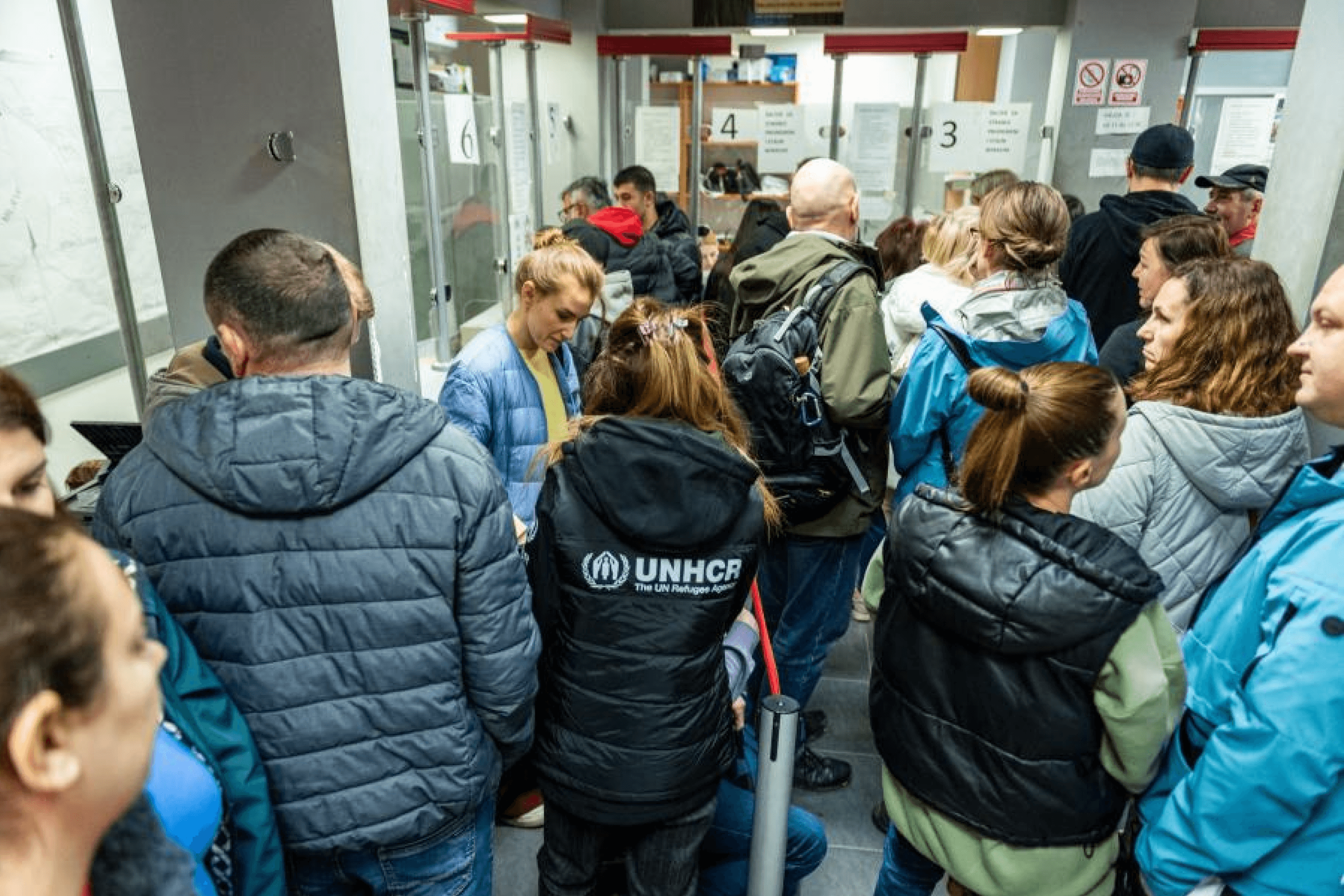Ukrainian refugees queue at a local office in Bar, Montenegro, to renew their temporary protection status. 2024.